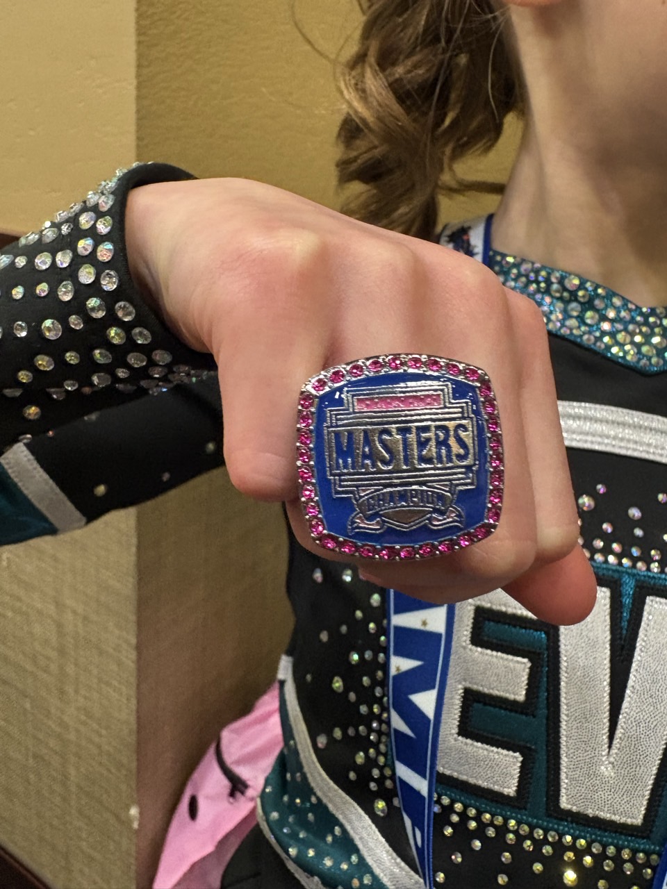 EVA athlete showing her Masters Champion ring